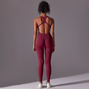 Detail of burgundy seamless yoga catsuit with an open racerback and sculpting fit
