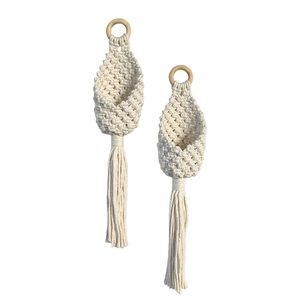 Set of two bohemian hand-woven cotton rope hanging baskets with tassels for home wall decor