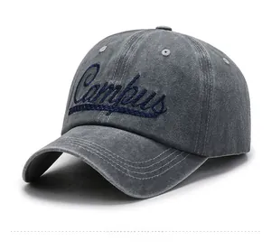 Detailed view of washed grey cotton baseball cap with blue Campus script embroidery