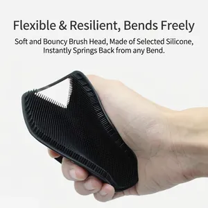 Flexible black silicone body scrubber with ergonomic grip for exfoliation and shower use
