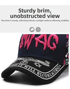 Detailed embroidery of pink SWAG text and gothic print on navy baseball cap brim