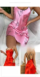 Detail of pink silk sleepwear with love print and backless cross-strap design