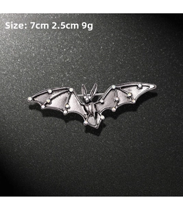 Macro shot of silver bat brooch with colorful rhinestones, size 7cm x 2.5cm, weight 9g