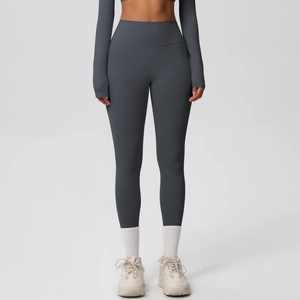 Front view of high-waisted dark grey yoga set with long sleeve top and matte leggings