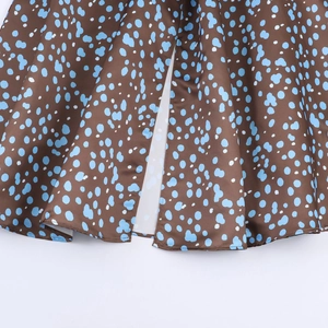 Elegant vintage polka dot satin dress with a stylish leg slit and puff sleeves