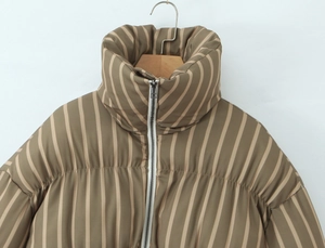 Detail of khaki striped puffer jacket with a high stand collar and zip closure