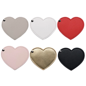 Portable heart-shaped PU leather makeup mirrors in six colors including beige and red