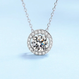 Close-up of a 925 sterling silver halo pendant necklace with a round-cut center stone