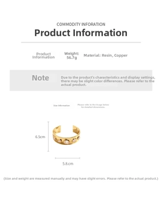 Détails du bracelet en résine dorée indiquant le poids de 56,7g et la hauteur 6,5cm