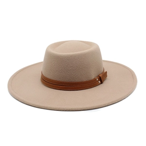 Close-up of khaki wool felt hat with brown leather band and silver rivet detail