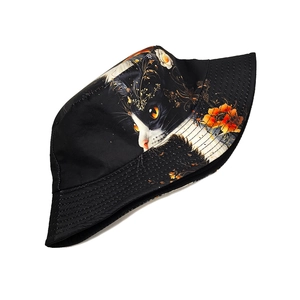 Black bucket hat with artistic cat and floral print on high-quality canvas fabric