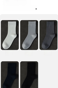 Detailed knit texture of premium cotton crew socks in white, pine, and iron grey colors