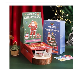 Close-up of colorful Christmas paper gift bags with festive patterns and warm lighting