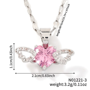 Macro shot of pink heart pendant with cubic zirconia wings and size measurements