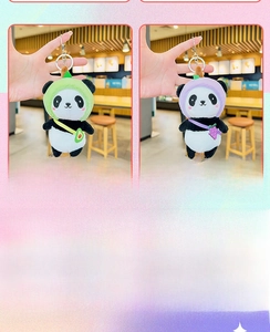 Detail of plush panda keychains featuring cute avocado and grape fruit hats with metal clips