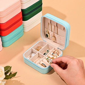 Portable velvet jewelry box for rings and necklaces shown in multiple colors and open view