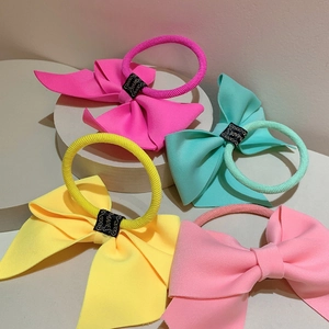 Neon color bow hair scrunchies set in yellow, green, pink and rose colors