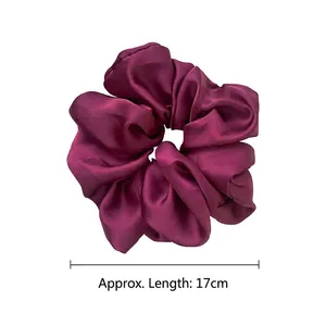 Oversized dark purple satin scrunchie with pleated silk texture, length approx 17cm