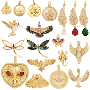 Golden micro-pave animal pendants collection featuring bees, eagles, and butterflies
