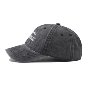 Detail of vintage washed cotton baseball cap with white Los Angeles embroidery