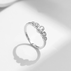 Elegant S925 sterling silver ring featuring five sparkling round-cut CZ diamonds for women
