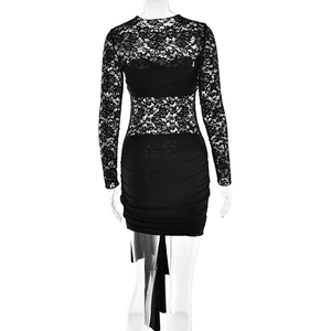 Detail of lace hollow-out back and slim fit ruched design on black long sleeve dress