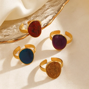 Set of vintage oval enamel adjustable gold steel rings in red, purple and blue