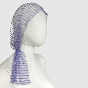 Detail of purple mesh headscarf with delicate pearls shown on a white mannequin head