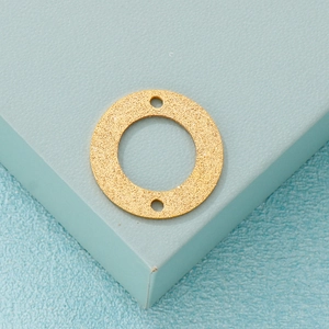 Golden matte stainless steel round pendant with double holes and sandblasted finish