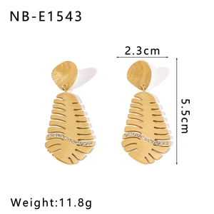 Detail of 18k gold plated leaf earrings with crystal rhinestones and size measurements