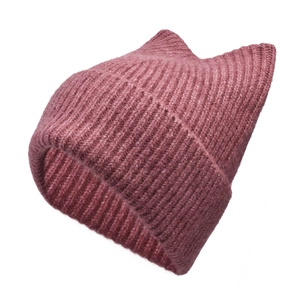 Detail of dark pink ribbed knit beanie with cute cat ears and thick folded cuff