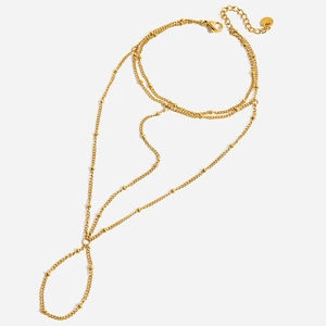 Bracelet bague élégant en chaîne satellite dorée avec pampille en maille et fermoir réglable
