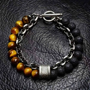 Macro view of beaded bracelet with tiger eye stones and metal toggle clasp