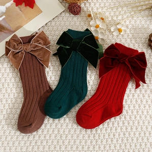 Baby knee high socks with velvet bows in brown, dark green, and red knit cotton