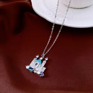18K gold plated silver castle necklace featuring colorful zircon stones on satin background