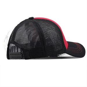 Detail of red and black trucker hat with mesh back and adjustable plastic snap closure