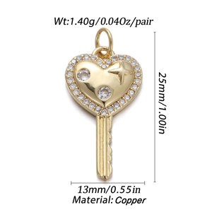 Detailed view of gold copper heart key pendant with dimensions and weight data