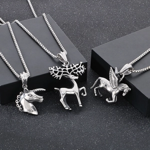 Silver stainless steel necklaces featuring unicorn, stag, and Pegasus pendants on black stands