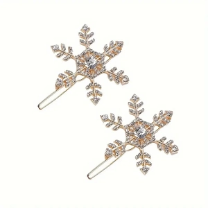 Champagne gold snowflake hair clips with sparkling rhinestones set on white background