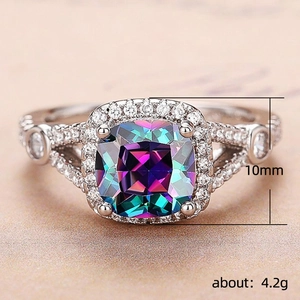 Elegant 10mm cushion-cut mystic topaz ring in silver setting with halo diamonds
