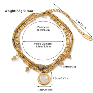 Detail view of double-layer titanium steel bracelet with shell pendant and size labels