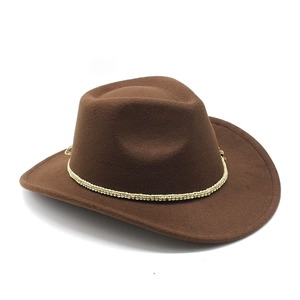 Detail view of a dark brown felt cowboy hat with braided beige rope decoration
