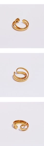Three-angle views of a double-layered gold ring with a minimalist open design