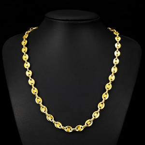 Gold-plated stainless steel coffee bean chain necklace displayed on a black bust mannequin