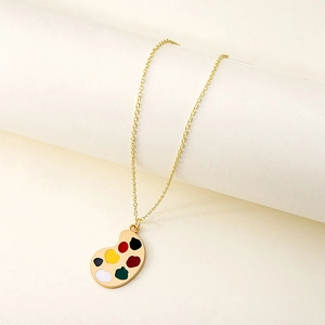 Artistic gold palette pendant necklace with vibrant colorful enamel on thin cross chain