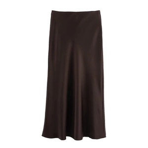 Detailed view of the dark brown satin midi skirt with elegant glossy texture and drape