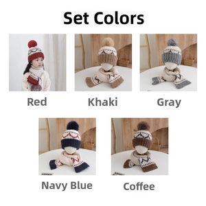Detail view of colorful knit hats and scarves set with geometric wave patterns and pom-poms