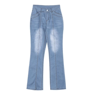 Slim fit light blue high waisted flare jeans with vintage wash and distressed detail