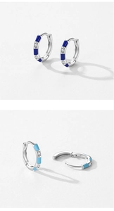 Detail of S925 silver hoop earrings with blue and turquoise enamel plus sparkling crystals