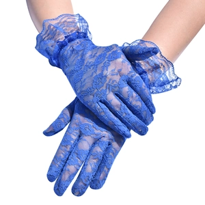 Detailed view of bright blue lace gloves with floral patterns and ruffled wrist cuffs